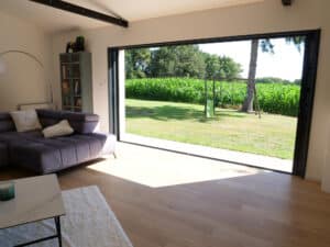 Baie vitrée coulissante à galandage - aluminium - Empreinte® - vue int- 2vt - Pasquet