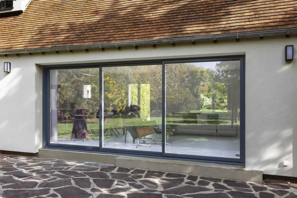 Baie vitrée coulissante - mixte - auralu® - vue ext - 3vt - Gris RAL 7016