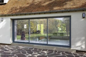 Baie vitrée coulissante - mixte - auralu® - vue ext - 3vt - Gris RAL 7016